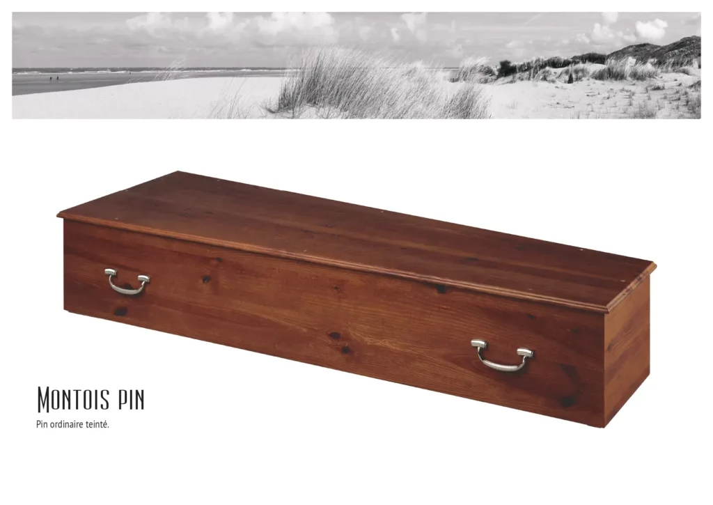 Cercueil Montois en pin ordinaire teinté avec poignées métalliques nickelées.